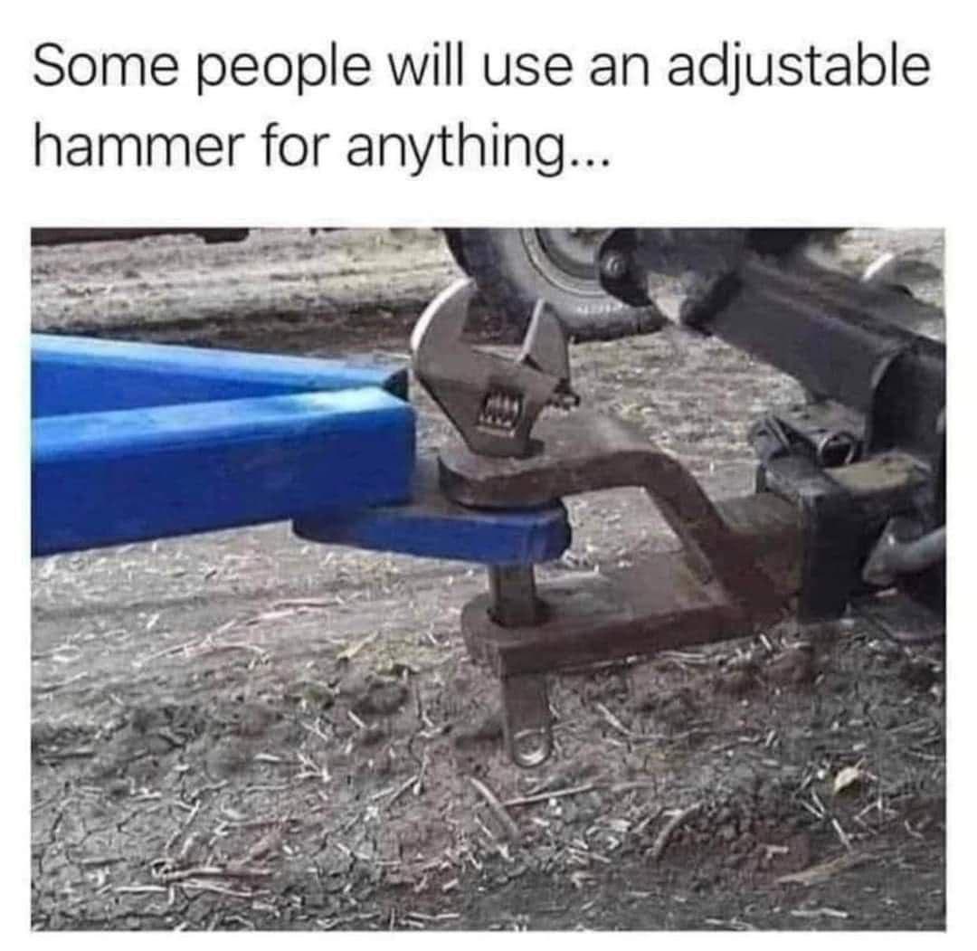 An adjustable wrench is a pin between a truck and a trailer. It is being called an adjustable hammer.