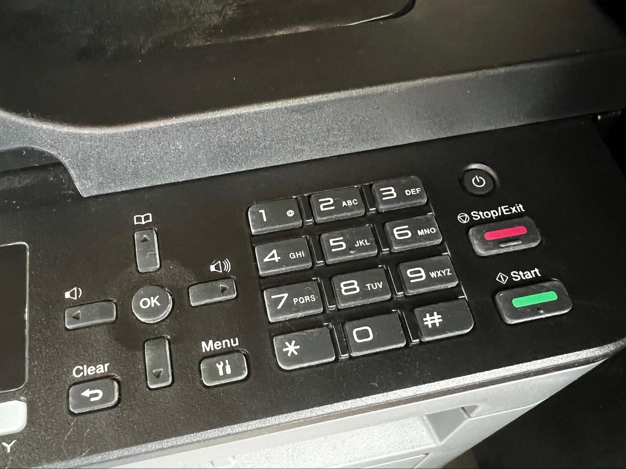 A picture of a printer, or more specifically the dial pad on the printer with the alphabet set onto buttons. For example 2 has A B C. What if you had to input a password on this?